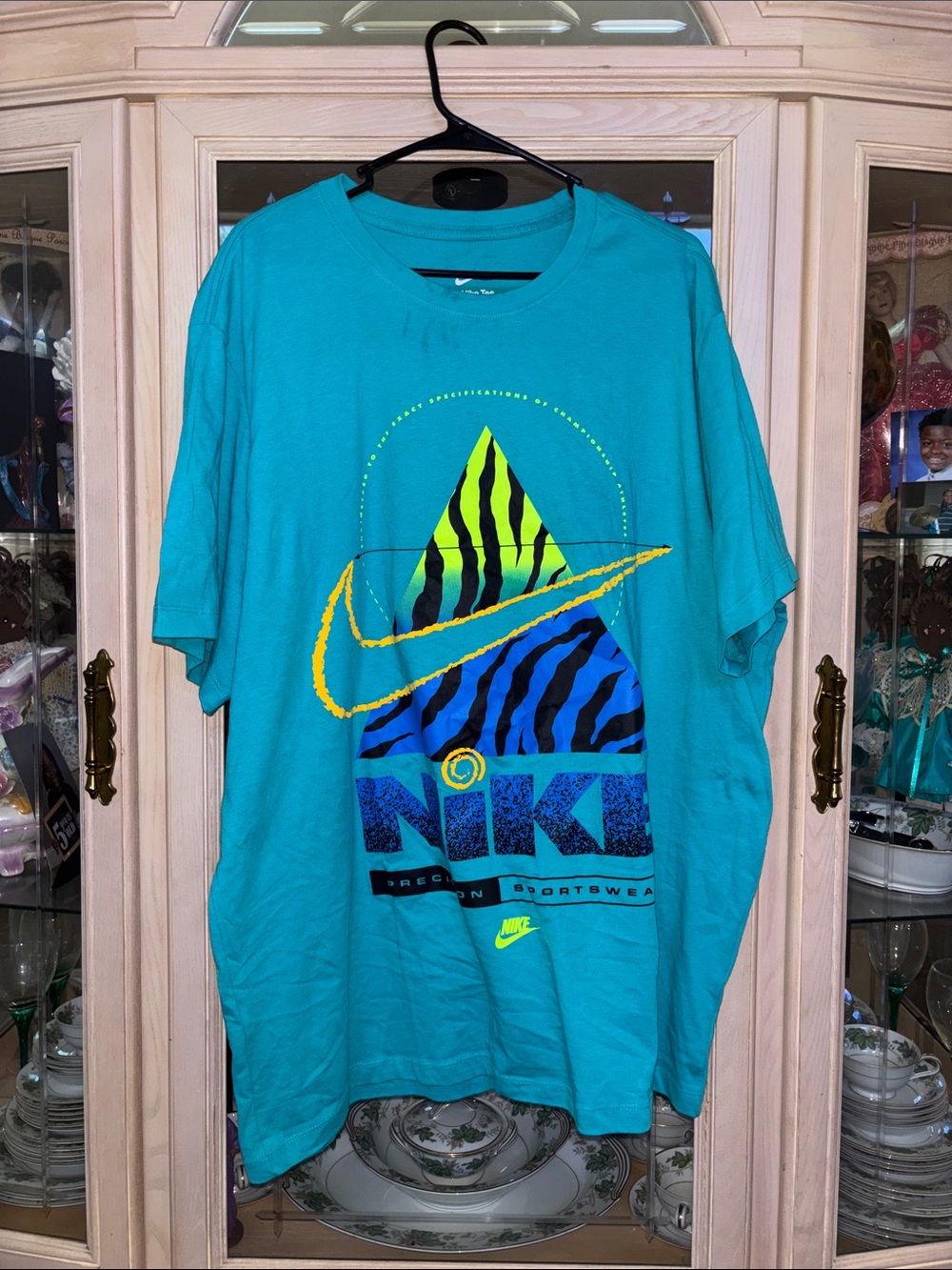 Nike Men's Teal Short-Sleeve Graphic Tee with Neon Accents
